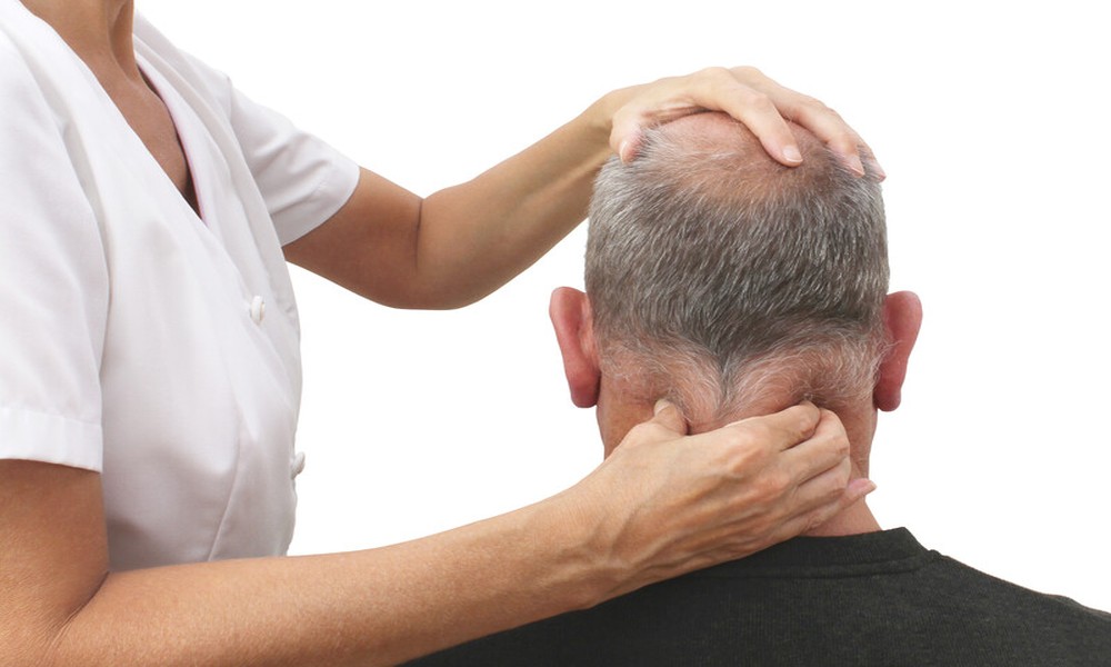 Could Your Migraines Be Coming From Your Upper Neck? The Research, Explained by Draper Spinal Care